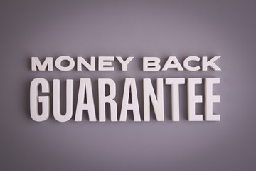 Money Back Guarantee sign lettering