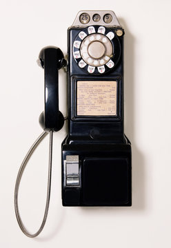old style wall mounted pay phone