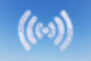 Naklejka premium wifi sign cloud on blue sky background