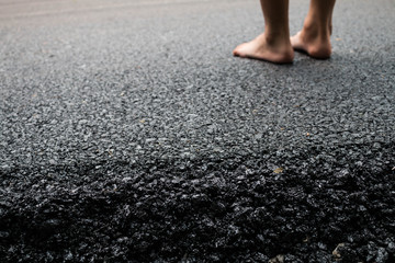 Black asphalt foot on the road  close up background.