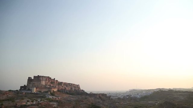 Clear sky above Mehrangarh fort and Jodhpur cityscape in background.