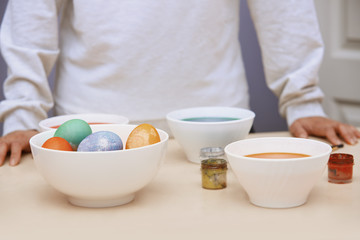 Woman preparing Easter eggs