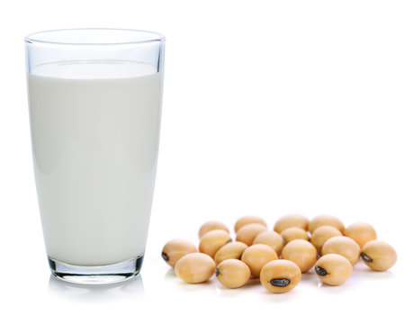 Milk With Soy Beans On White Background