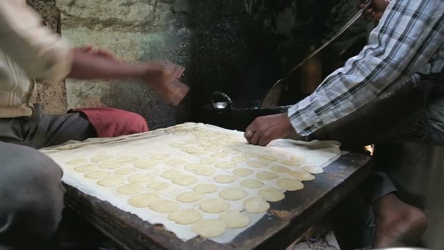 JODHPUR, INDIA - 5 FEBRUARY 2015: Close view of traditional indian food preparation called puri