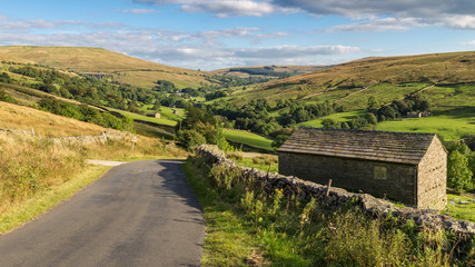 Obraz premium Landscape in the Yorkshire Dales, with Dent Head Viaduct in the background, near Cowgill, Cumbria, UK