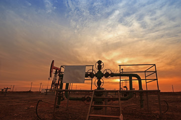 Naklejka premium Tube and valve, oil industry equipment