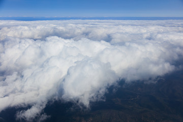 Naklejka na ściany i meble Blue sky with clouds, aerial photography
