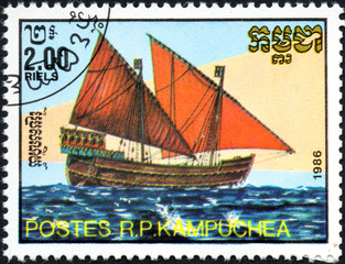 UKRAINE - CIRCA 2017: A postage stamp 2.00R printed in Cambodia shows old sailing Two-masted lateen-rigged ship, series Medieval Ships, circa 1986