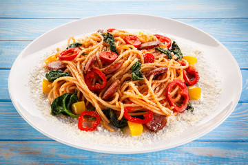 Spaghetti with vegetables and sausage