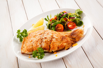 Fried cod with vegetables