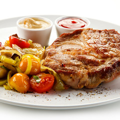 Roast steak on white plate
