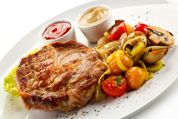 Roast steak on white plate