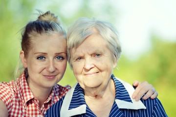 Senior and youg woman. Grandmother and granddaughter.