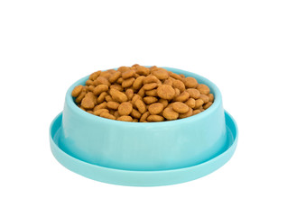 Dog food pellets in blue plastic tray on white background