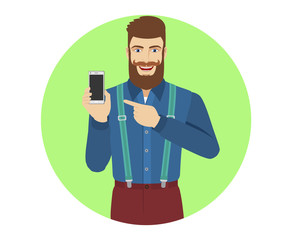 Hipster pointing at a mobile phone in his hand