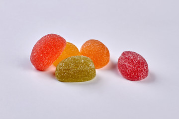 Jelly sweets on white background. Colorful candies covered in sugar. Buy confectionery at best price.