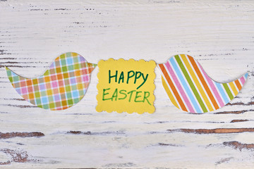 Happy Easter card, bird cutouts. Striped and checkered patterns. Creative Easter decoration ideas.