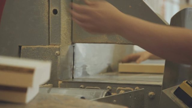 The production line for wood. Woodworking industry: machinery and equipment for cutting and grinding lamellae. Production of laminated veneer lumber.LVL Laminated Veneer Lumbe.