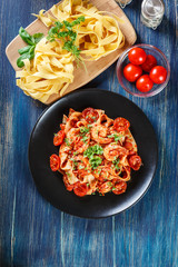Pappardelle pasta with shrimp, tomatoes and herbs