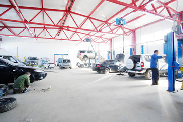 Naklejka na ściany i meble Interior of a car repair station