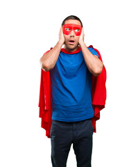 Worried superhero covering his ears © agongallud