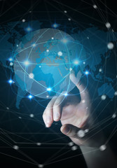 Businesswoman touching global network on planet earth 3D rendering © sdecoret