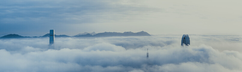 Naklejka premium Misty Hong Kong City in spring seasons