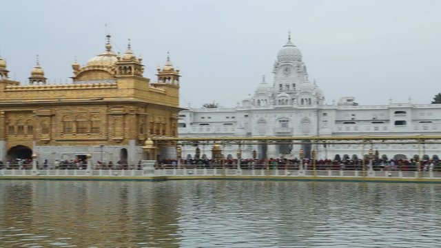 Panoramic view of long queue in front of Golden temple in Amritsar.