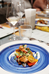 Chicken salad on blue plate