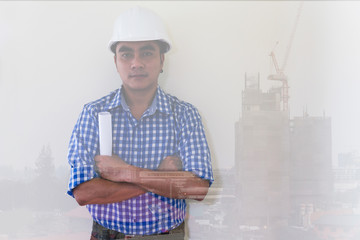 architect or engineer man with blueprint and white safety helmet at office double exposure with...