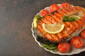 Roasted salmon steak with lemon