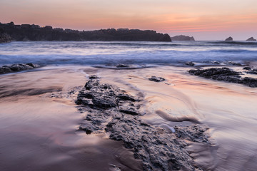 Sunset in the Portio Beach. Liencres. Cantabria. Spain.