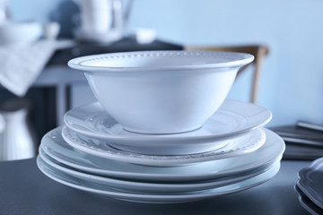 White dishes on grey table