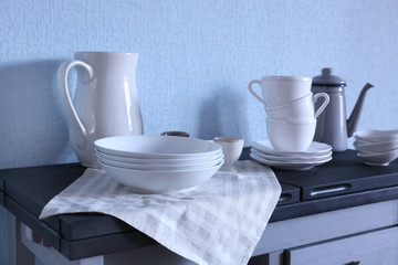 Obraz na płótnie Canvas Different dishware on kitchen table