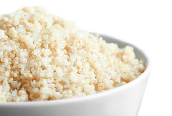 Ceramic bowl with boiled sprouted organic white quinoa grains, closeup