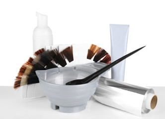 Set for coloring and hair samples of different tints isolated on white