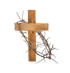 Crown of thorns and wooden cross on white background