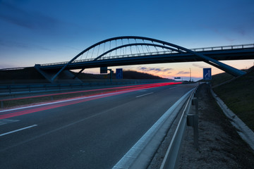 modern bridge ovet the highway, evening light,Nitra, Slovakia