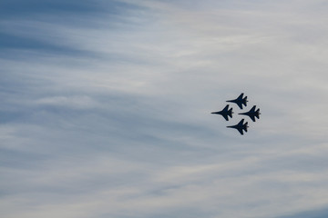 Military airplanes in the blue sky