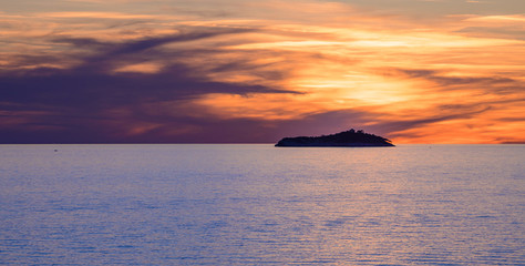 Sunset over Sveti Andrija island near Dubrovnik, Croatia