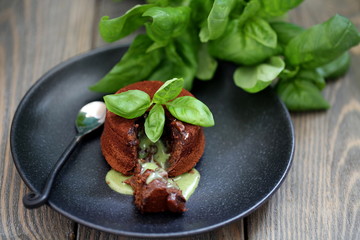 Chocolate fondant lava cake with basil ganache