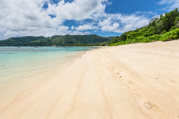 Wide angle view of tropical beach Anse Royale at Mahe island, Seychelles - vacation background