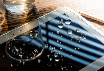 Drops of water on tablet screen
