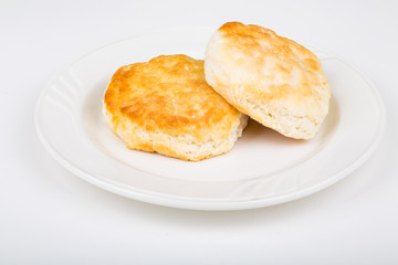 Two Fluffy Biscuits on a White Plate
