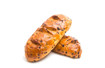 Bun with chocolate drops isolated