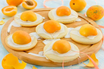Easter egg cookies - shortbread cookies with glaze and apricots shaped fried eggs