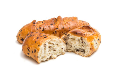 Bun with chocolate drops isolated