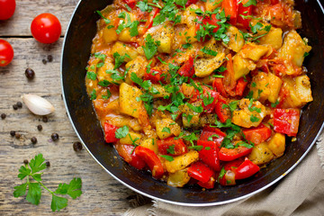 Eggplant stew with sweet pepper, tomato and onion