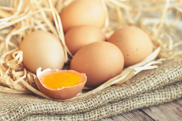 Eggs over jute sack background. Happy easter.