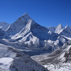 Fototapeta na wymiar Majestic mount Ama Dablam on a morning after new snowfall. Mountain in the Mount Everest National Park, Nepal. Popular for climbing.